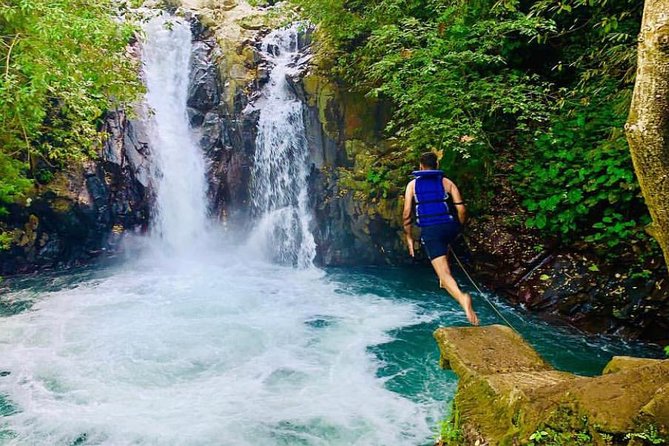 All Inclusive : Jumping Sliding at Aling- Aling Waterfall - Handara Gate - Lunch - Indonesian lunch and a coffee plantation stop