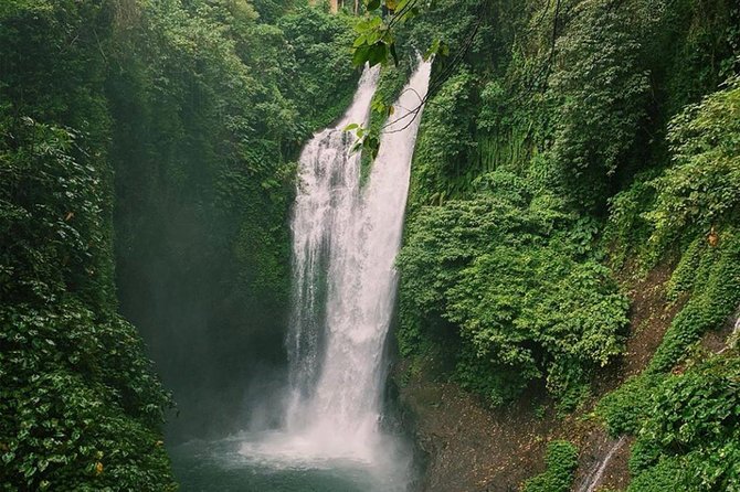 All Inclusive : Jumping Sliding at Aling- Aling Waterfall - Handara Gate - Lunch - Handara Gate and the green hill backdrop