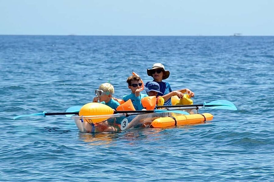 Bali/Amed: Transparent Kayak Experience - Getting on the transparent kayak