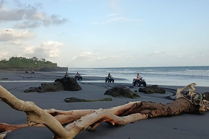 Bali ATV Ride In the beach sunset atv tour - Crossing the black-sand beach
