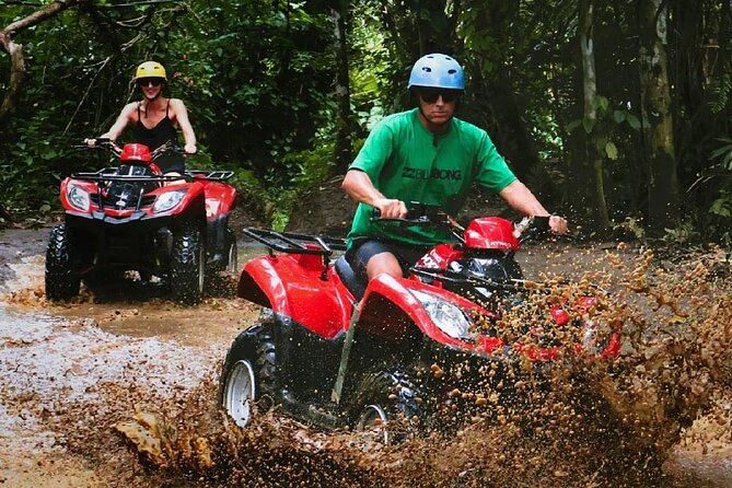 Bali ATV Ride tour Ubud - River crossings, a waterfall, and the tunnel