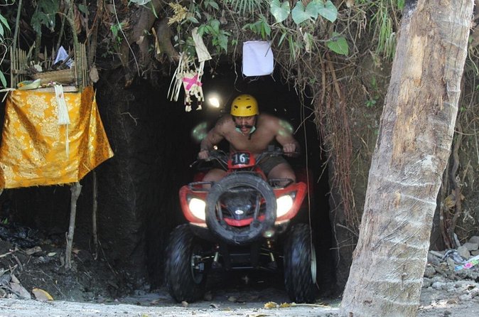 Bali Atv Riding through Cave and Waterfall - Entering the cave and handling the muddy track