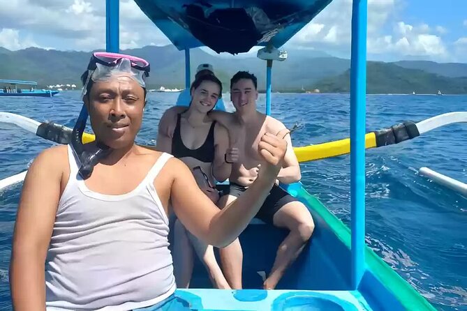 Bali: Fishing Charter Private Boat - Boarding the boat near Gili Mimpang
