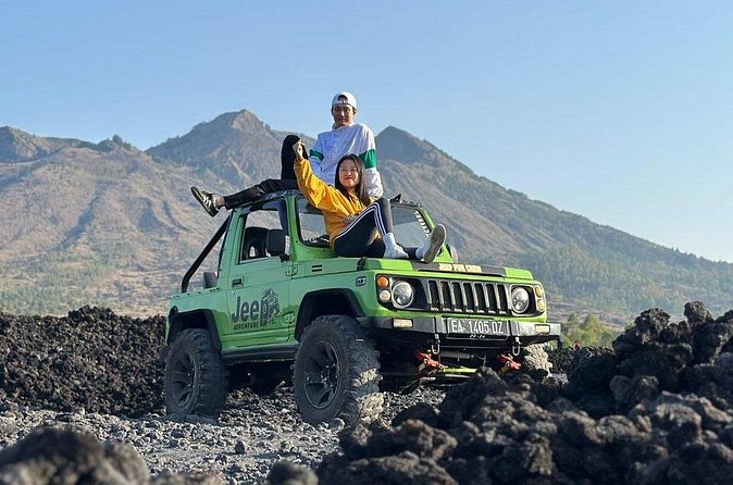 Bali Mount Batur Jeep Sunrise and Black Lava Jeep Tour - Relaxing at the natural hot spring by Lake Batur