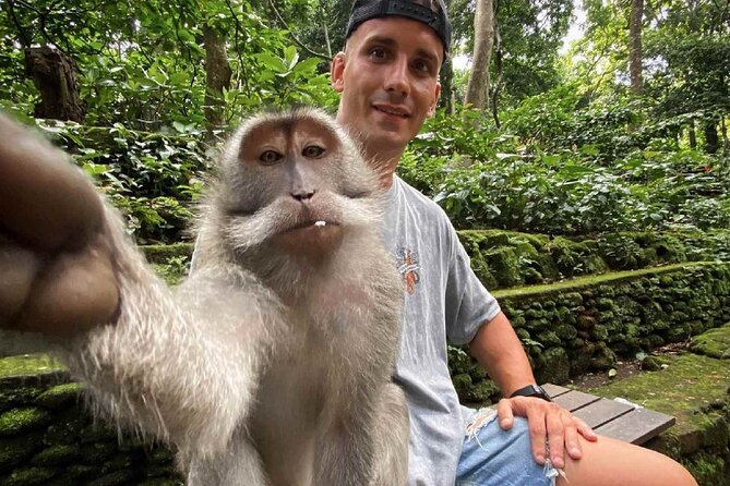 Bali Swing, Monkey Forest and Waterfall Private Tour - Kanto Lampo Waterfall and its broad rock shelves