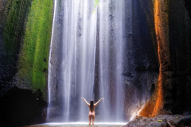 Bali Tour : Tegenungan - Tukad Cepung - Kanto Lampo - Tibumana Waterfall - Kanto Lampo: a lowland waterfall with a different shape