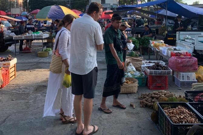 Balinese Cooking Class with Traditional Market Tour - Cooking in a traditional open kitchen