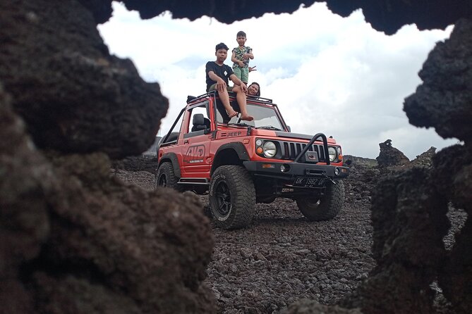 Batur Volcano Sunrise And Black Lava Jeep Adventure Tour - Black lava and sandy volcanic ground