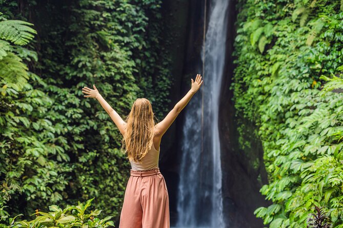 Discover Hidden Waterfall, Unesco Rice Terraces and Mountain Temple - Walking through Leke Leke Waterfall’s jungle path