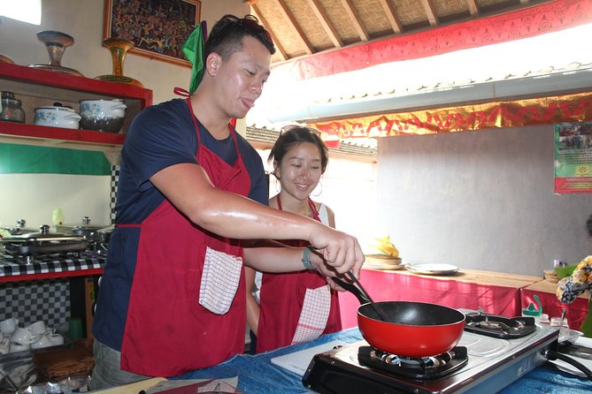 From Ubud : Ubud Balinese cooking class with Market tour - Grinding the Balinese spice paste
