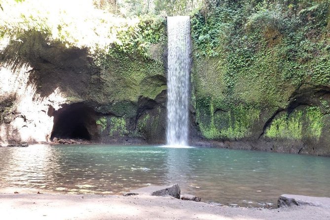 Get wet on Bali's most stunning waterfalls - Tukad Cepung: a jungle walk to an unusual waterfall
