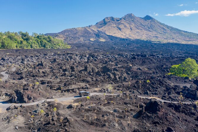 Kintamani Black Lava Sunrise Jeep Adventure with Temple in Bali - Tirta Empul brings a sacred pause