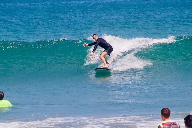 Legian Beach Bali Surf Lesson All Level 2 Hour with Pro Coach - Paddling out and catching the first waves