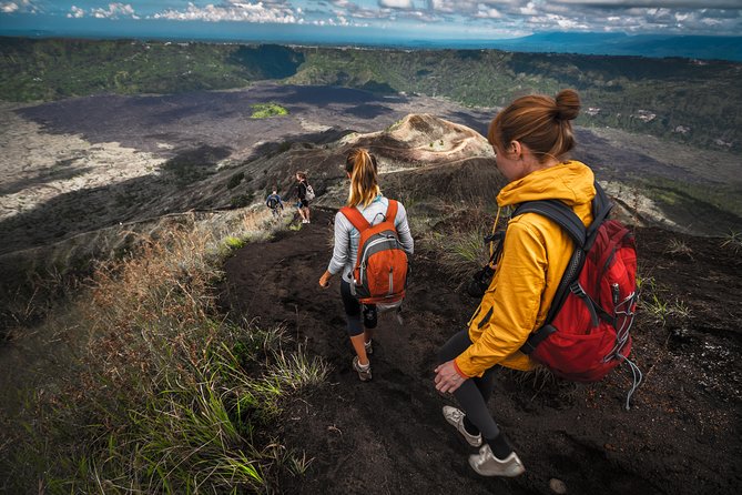 Mount Batur Sunrise Trekking and Rice Terrace Adventure - The daylight descent through black sand and lava