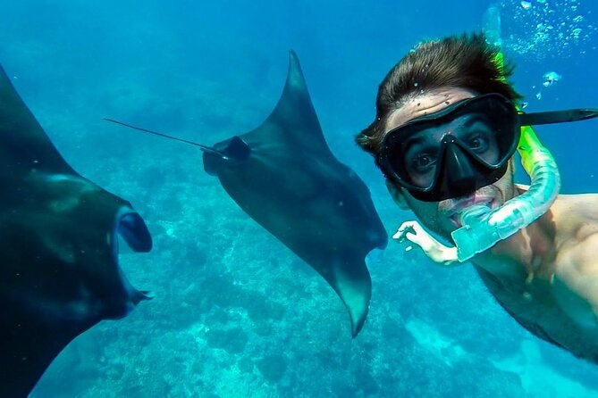 Nusa Penida Snorkeling 3 Point with Manta Bay & Land Tour - Arriving at Nusa Penida and changing boats