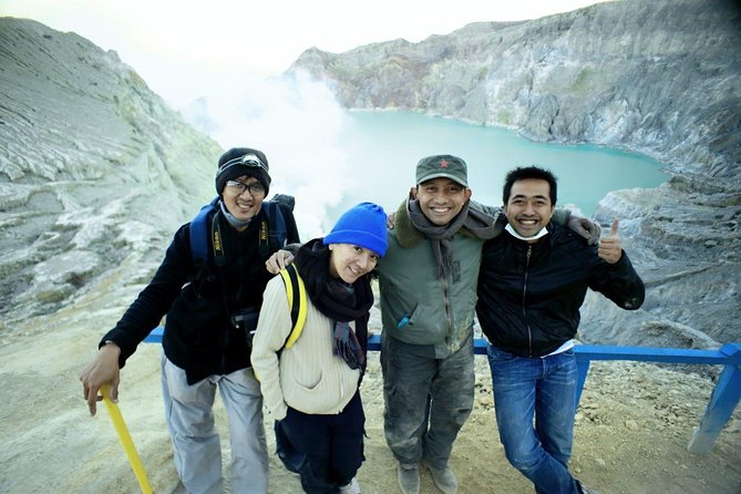 Overnight Mount Ijen Blue Fire Trek Tour From Bali (Private-All Inclusive) - Sulfur miners add human meaning to the view