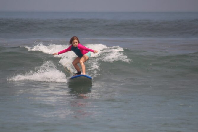 Private Beginner 1 on 1 Surf Lesson at Kuta Beach - Entering easy waves at Kuta Beach