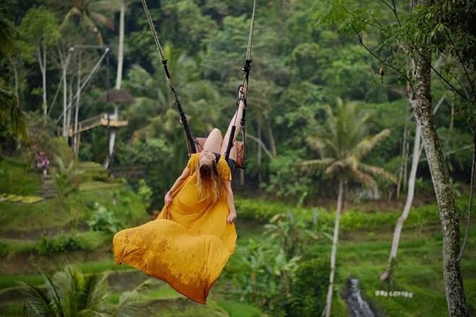 Private Day Tour To Waterfalls And Ubud Sightseeing - Kanto Lampo Waterfall and its stepped rocks
