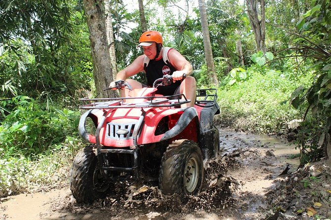 Quad Bike Ride and Snorkeling at Blue Lagoon Beach All-inclusive - Mud, tunnels, waterfalls, and rice fields
