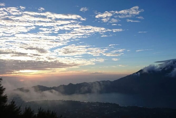 Sharing Mount Batur Sunrise Trekking Guide Pick Up and Drop Off - Reaching the crater between 6:15 and 6:45 a.m.