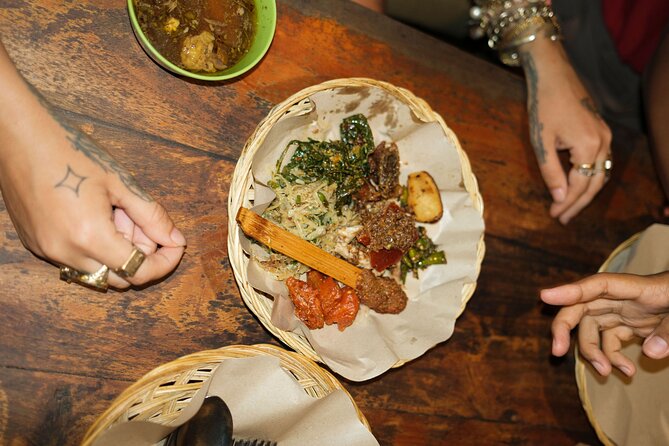 Taste & Explore Bali: Denpasar Street Food & Historic Sites - Jalan Gajah Mada mixes old buildings and local eating