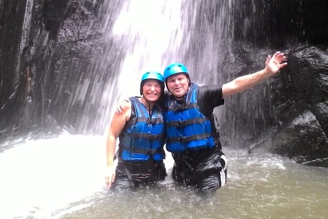 The Best Ayung River Rafting Adventure in Ubud - Getting ready with a helmet, life jacket, and paddle