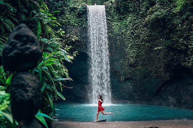 Trunyan Cemetery, Hot Spring, Penglipuran Village, and Waterfall Tour - Tibumana Waterfall for the final nature stop