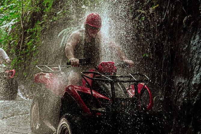 Ubud Bali ATV Quad Bike Legong Temple cave with Lunch and Pool - Riding an ATV through Ubud’s countryside