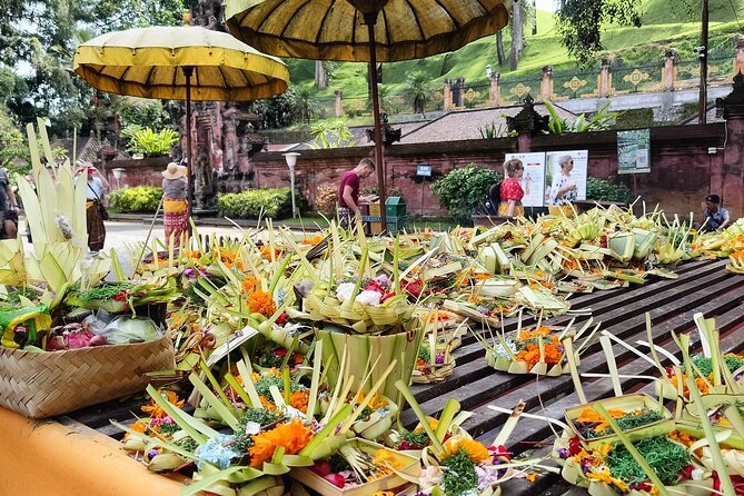 Ubud Tirta Empul Temple Tour with Purification Experience - Entering the cold holy springs