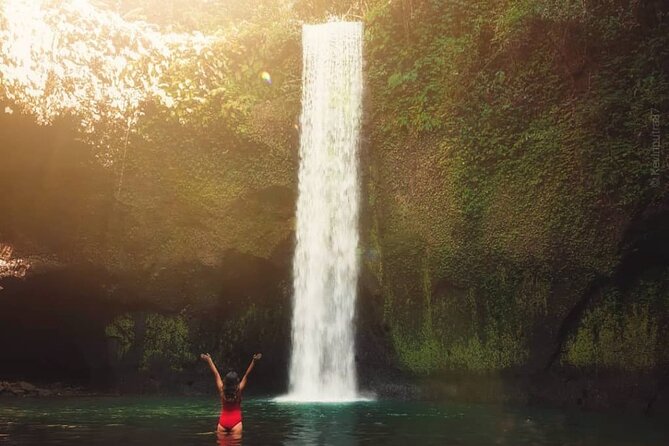 Ubud Waterfalls, Temple and Rice Terrace - Private Tour - Kanto Lampo Waterfall begins the day with a splash
