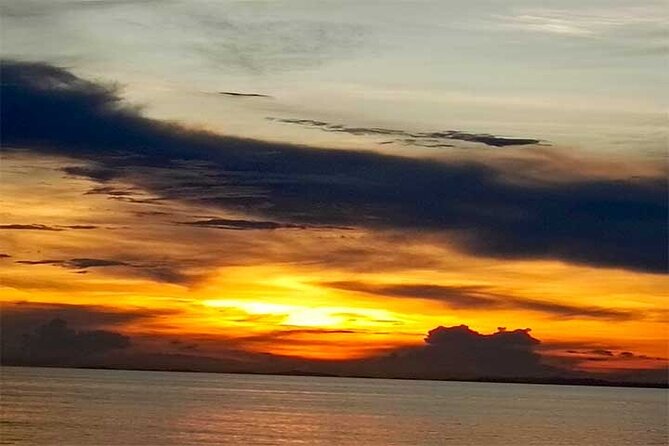 Uluwatu Temple with Sunset Tours - Uluwatu Temple above the Indian Ocean